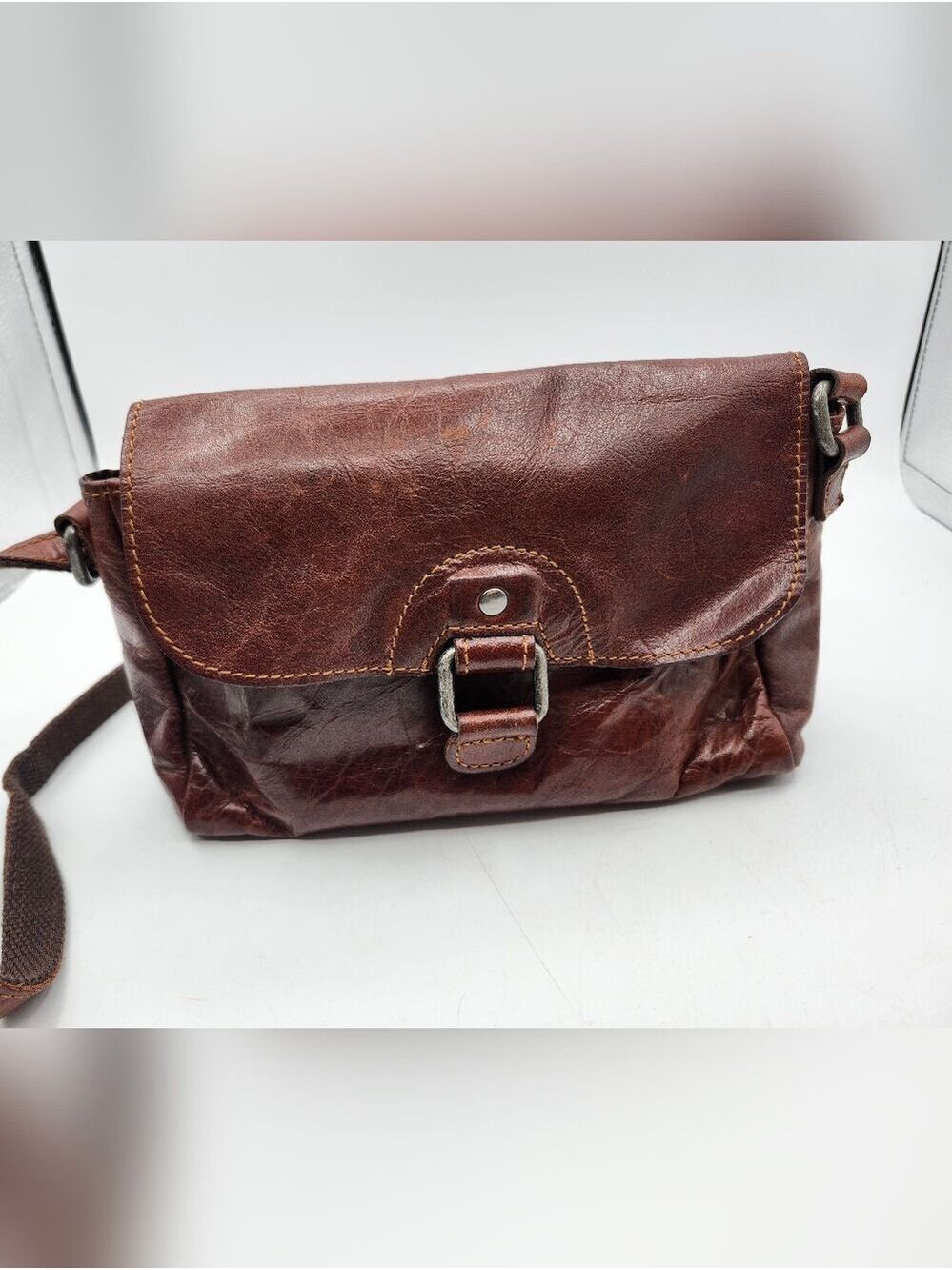 Jack Georges Compact Brown Leather Crossbody Bag with Front Buckle